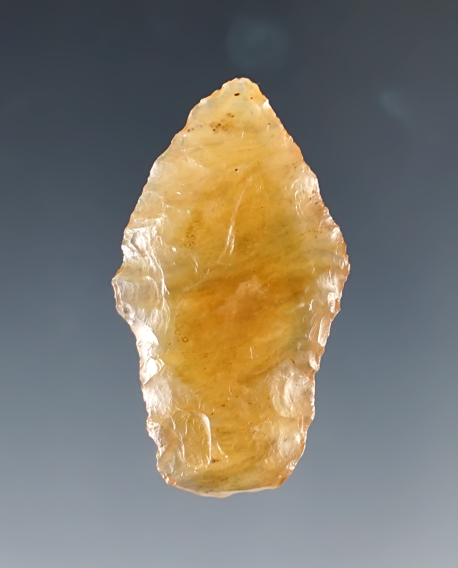 Translucent 1 3/8" Stemmed Dart point found in the Four Corners area.