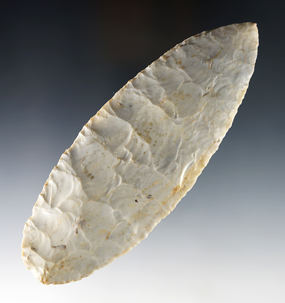 Large 5 9/16" Adena Blade that is nicely flaked. Burin at the tip. Found in the Midwestern U.S.