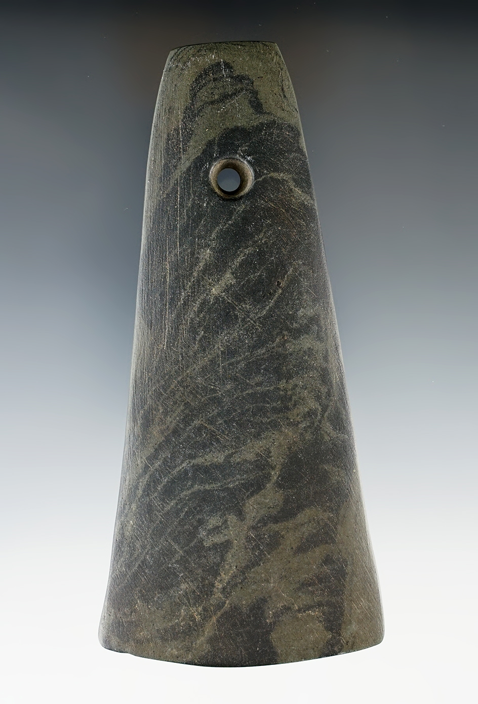 4 7/8" Adena Trapezoidal Pendant made from green and black Mottled Slate. Found in Summit Co., Ohio.