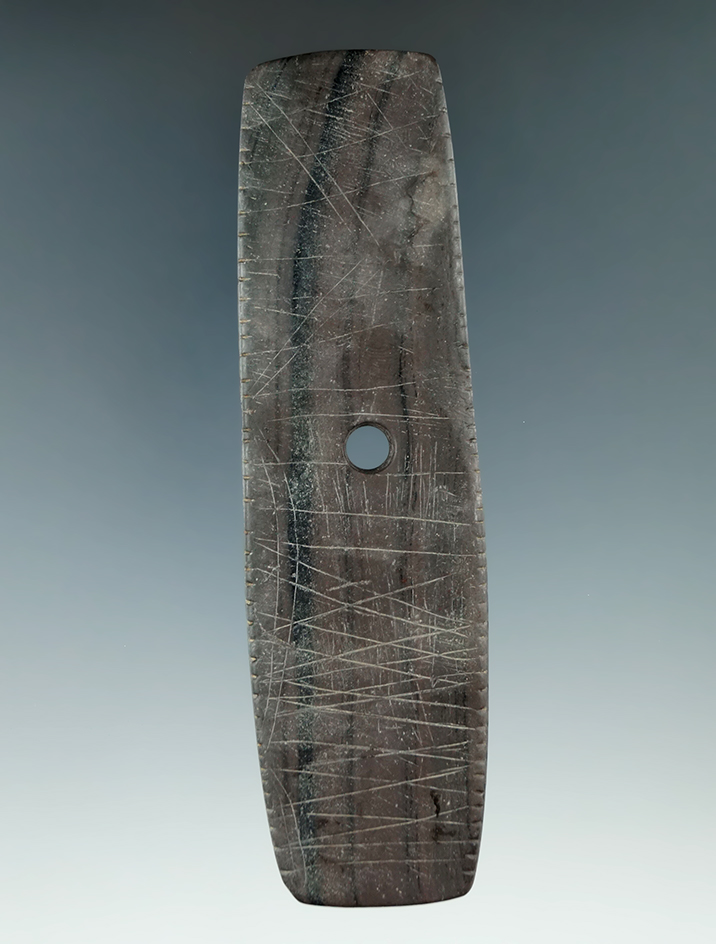 4 5/8" Hopewell Trapezoidal Pendant that is highly engraved and tallied, found in Northeast Ohio.