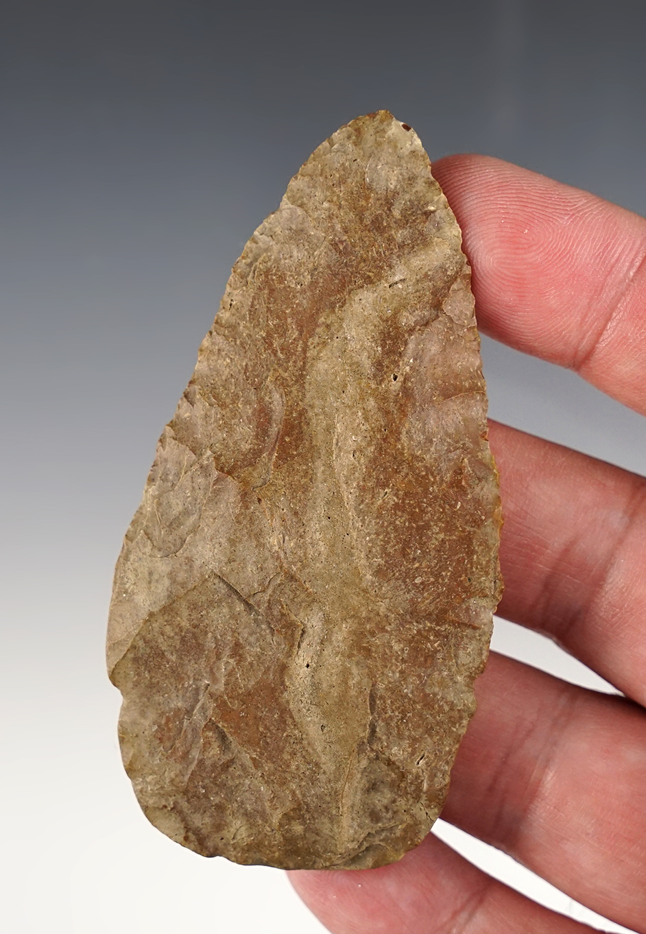 3 5/16" late Paleo/early Archaic Blade with heavily ground basal area.  Marion Co., Ohio.