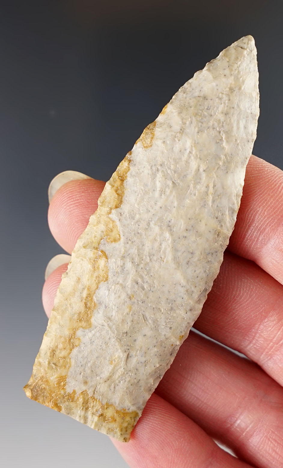 Uniquely styled base on this 3 1/16" Paleo Lanceolate made from Plum Run Flint. Found in Ohio. 