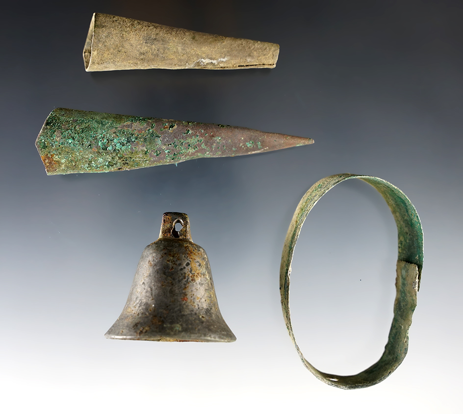 Four contact Period Metal artifacts recovered at the Burrell Creek site, New York. Largest is 3 9/16".