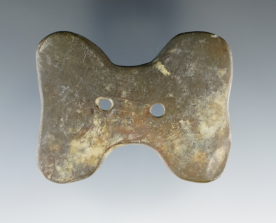 2 1/2" Hopewell Reel Gorget found in Ohio. Pictured in Who's Who #10, page 20.