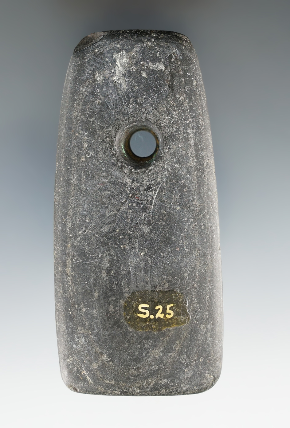 3 9/16" Adena Trapezoidal Pendant made from Banded Slate, found in Ohio. Ex. Dean Driscoll.
