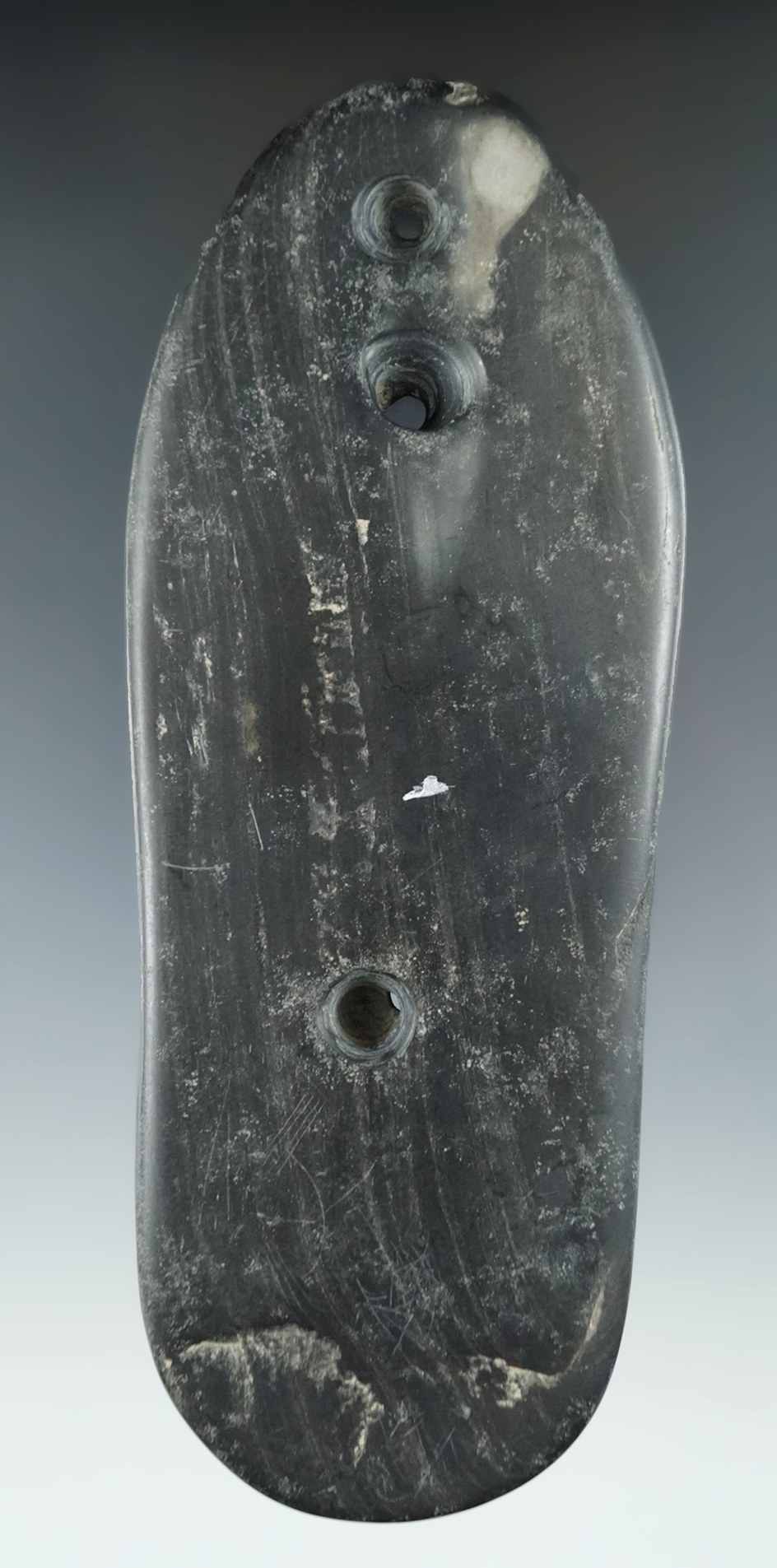 5 9/16" Three-hole Sandal Sole Gorget with unique engravings. Found in Ohio. Ex. C.Platt.