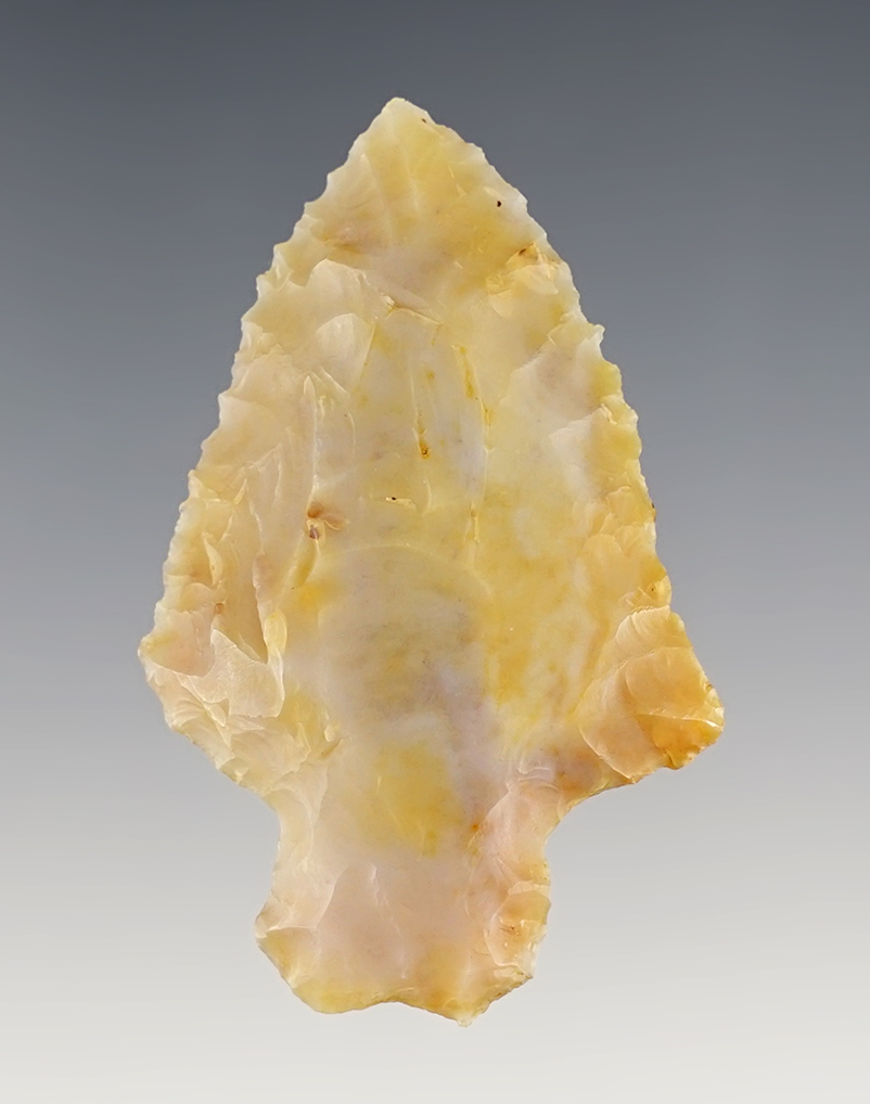 2 1/16" Bifurcated Point that is finely serrated. Flint Ridge Flint. Found in Logan Co., Ohio.