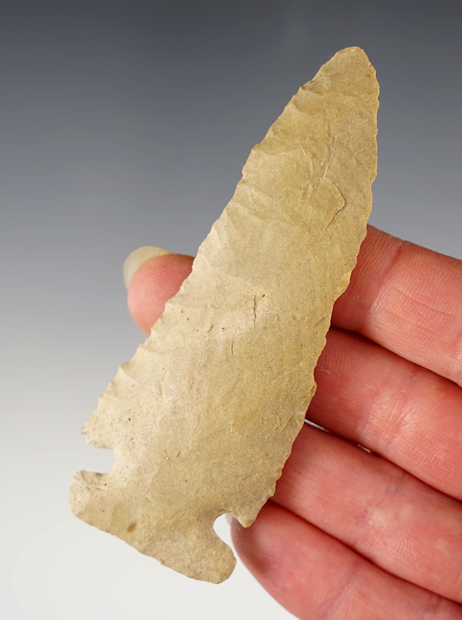 Well made 3 9/16" Archaic point that is slightly beveled with grinding to the base. Ohio/Kentucky.