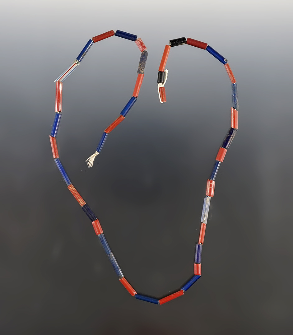 17" Strand of red & blue Tubular Straw Beads. Found at the Dann Site in Lima, New York. 