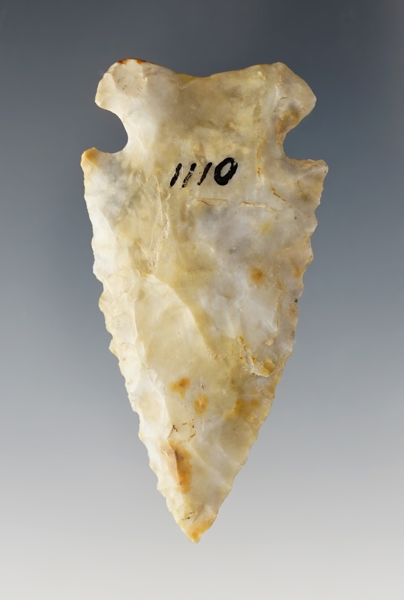 Fine 2 3/8" serrated Cornernotch made from Flint Ridge Flint. Found in Knox Co., Ohio. Ex. Hooks. 