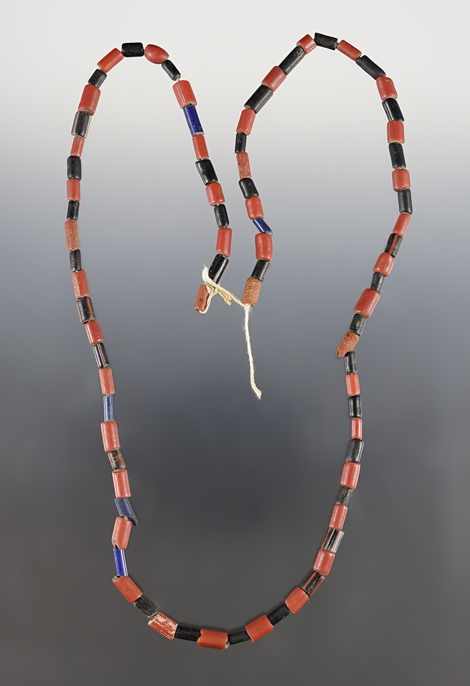 23" Strand of black, red & blue Barrels and Tubular Beads, Dann Site, Lima, Monroe Co., New York. 