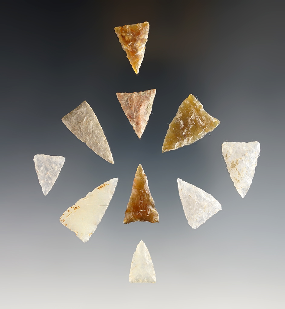Group of 10 Plains Triangular Arrowheads all made from patinated chert.