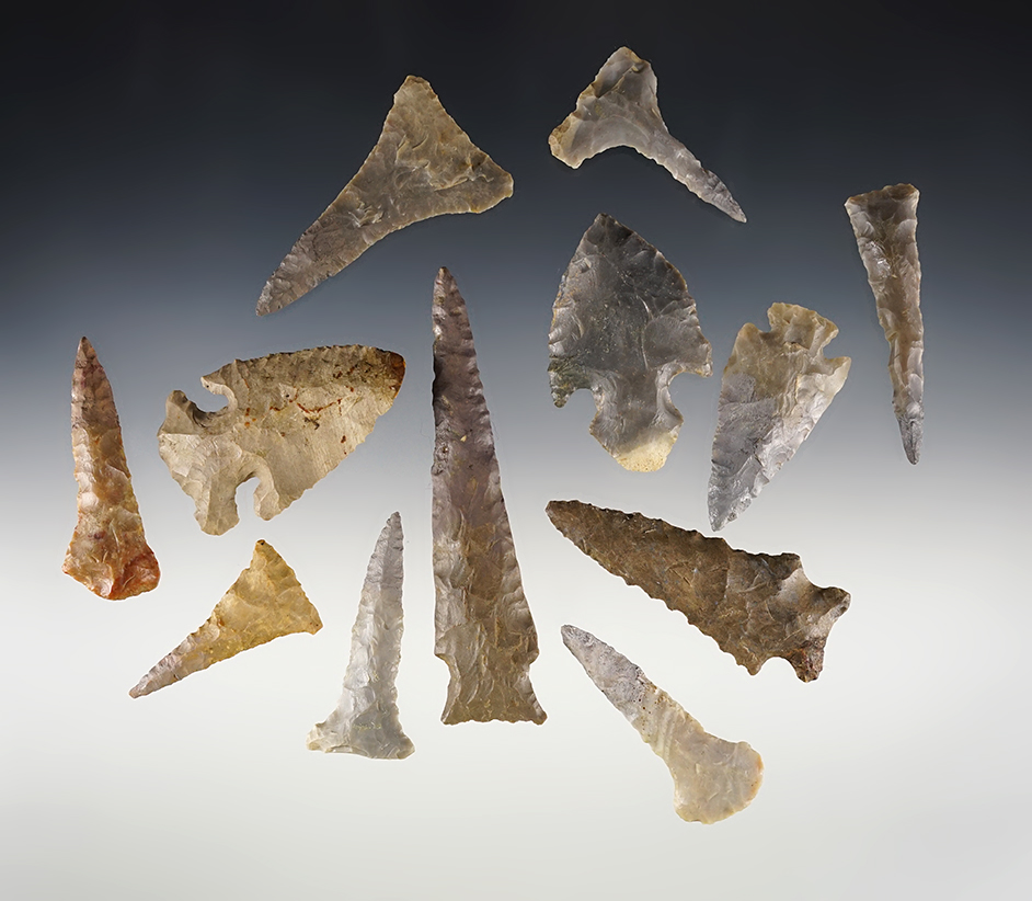 Set of 12 restored points that display well. The largest is 3 13/16".