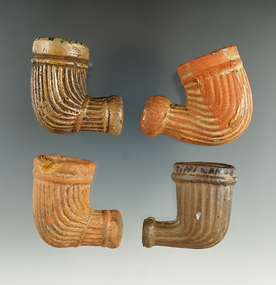 Set of four clay trade pipes.