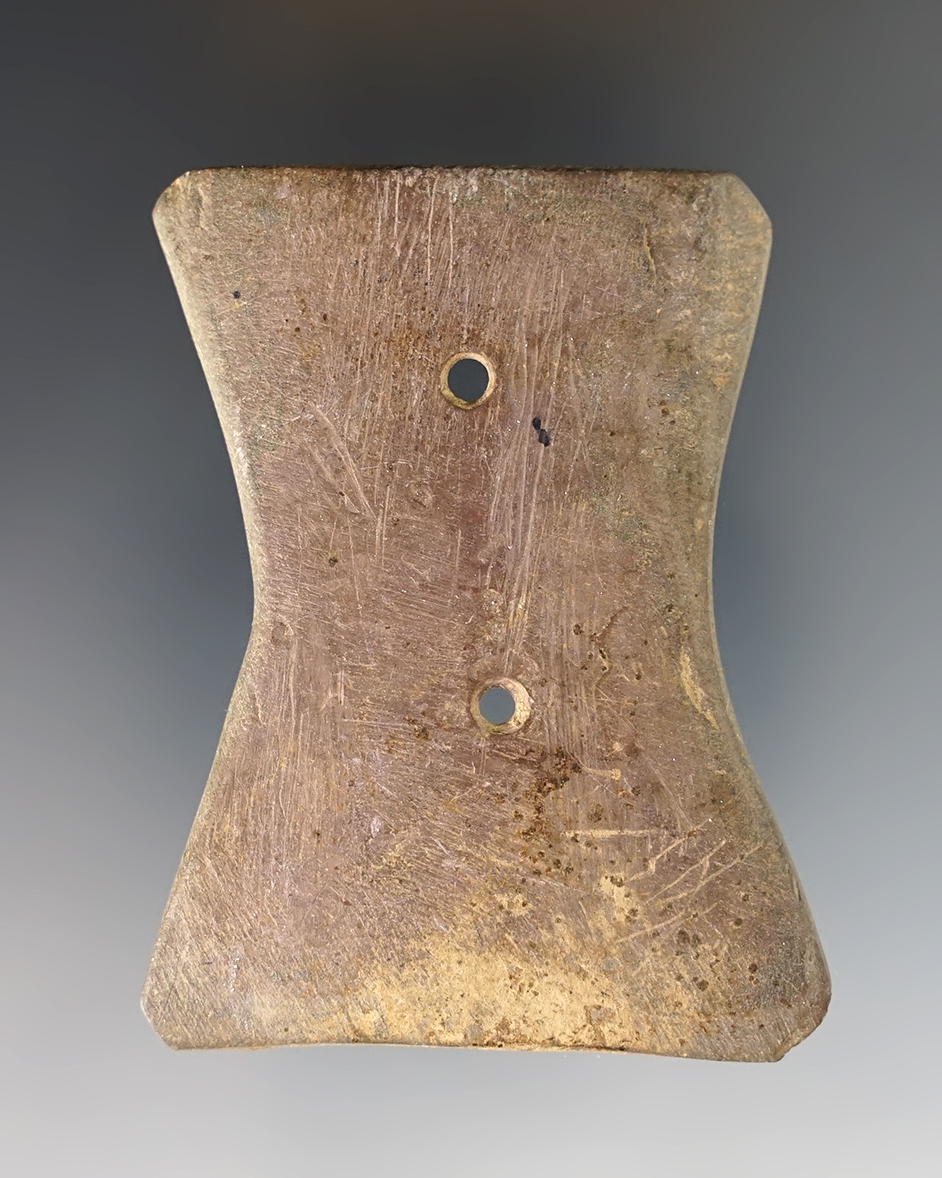 Nicely made 2 5/8" wide Bi-Concave Gorget with heavily mineral deposits on the surface.